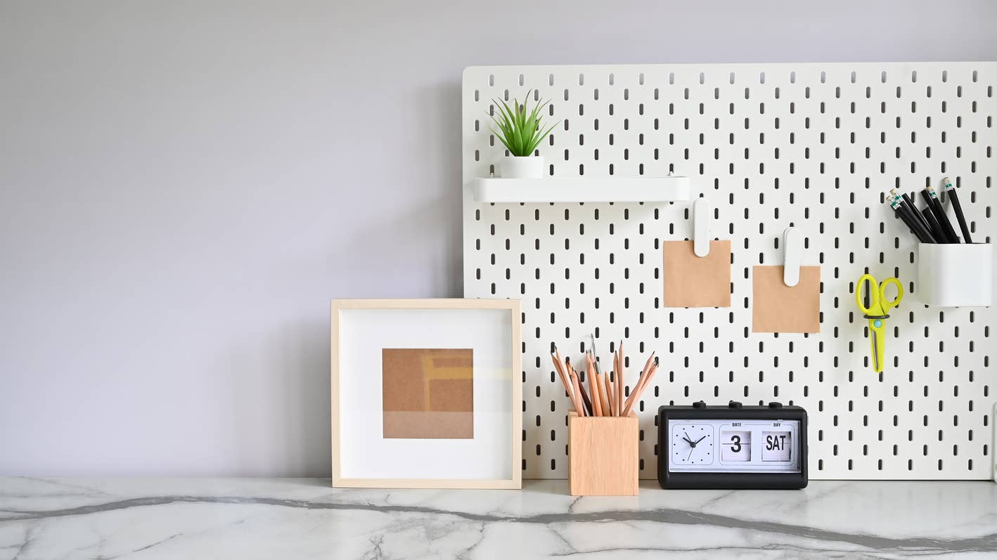 DIYer Turns IKEA SKÅDIS Into Useful and Cozy Wall Storage - Dengarden