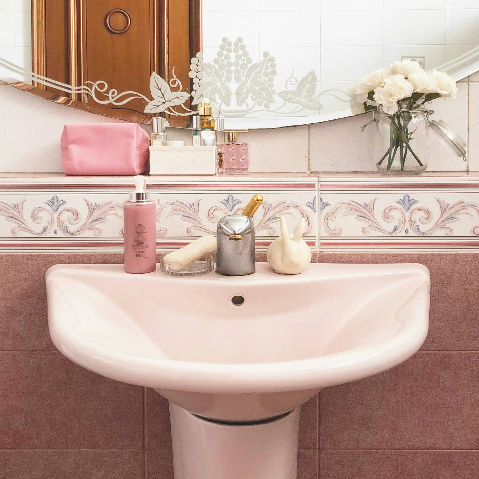 Woman Transforms Her Pink Tiled Bathroom From the 1950s Without Doing Any Demo Work