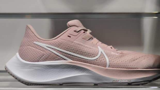New Nike shoes that are pink with white soles
