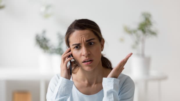 Upset unpleasantly surprised woman making phone call, disputing, complaining, having bad conversation with friend or client,