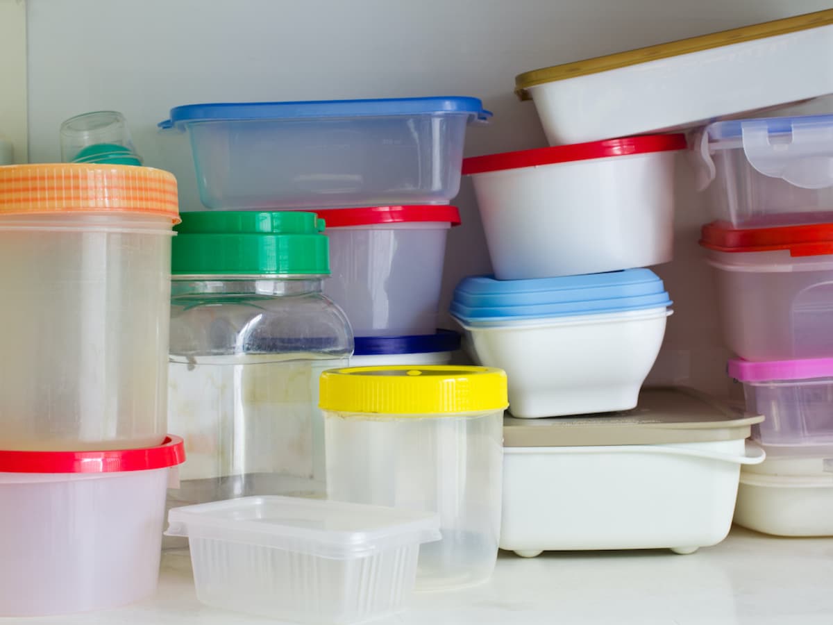 The Brilliant Storage Hack That Keeps Your Plastic Container Lids Organized
