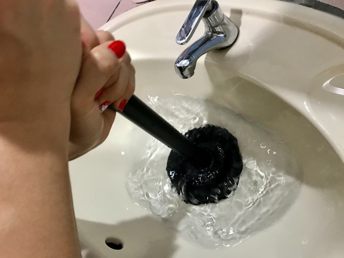 How to Snake a Clogged Sink Drain (With Pictures) - Dengarden