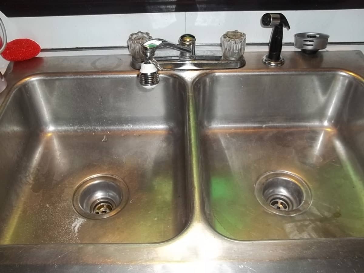 Kitchen sink clogged with standing water shop