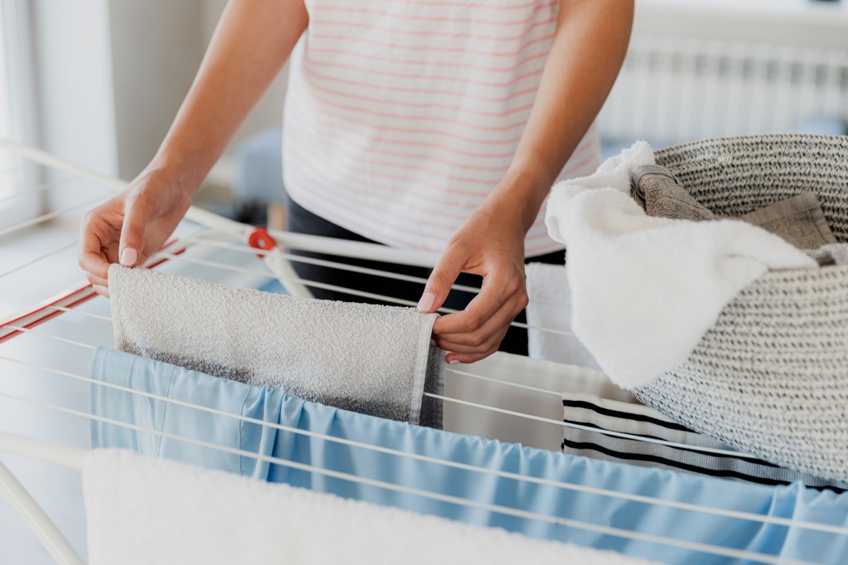 Woman Turns Huge Outdoor Drying Rack Into Perfect Indoor Version