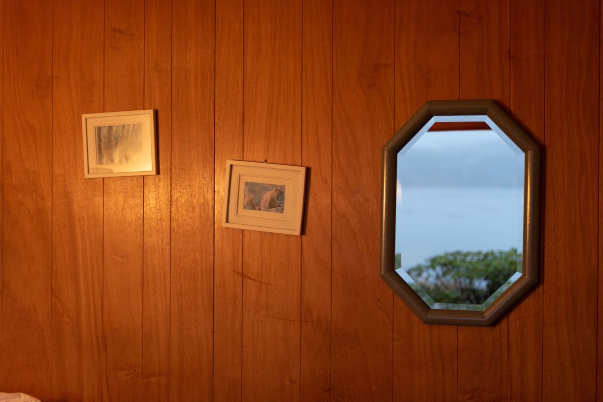 Woman Shares Genius Hack for Hanging Mirror on an Uneven Wall