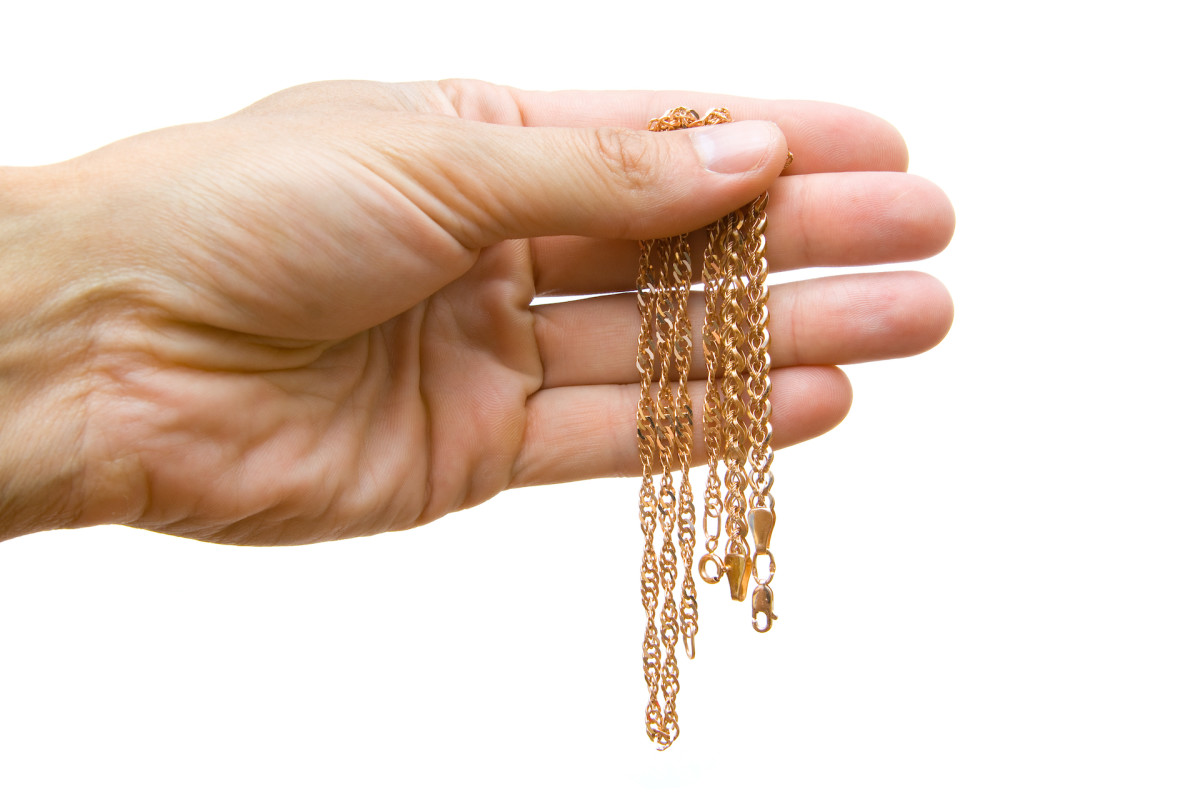 Woman Tries Using RustOleum to Save Fake Jewelry From Turning Green