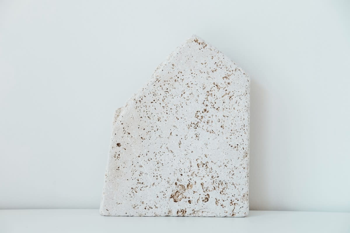 Woman Makes Travertine Side Table That Looks Like It Cost