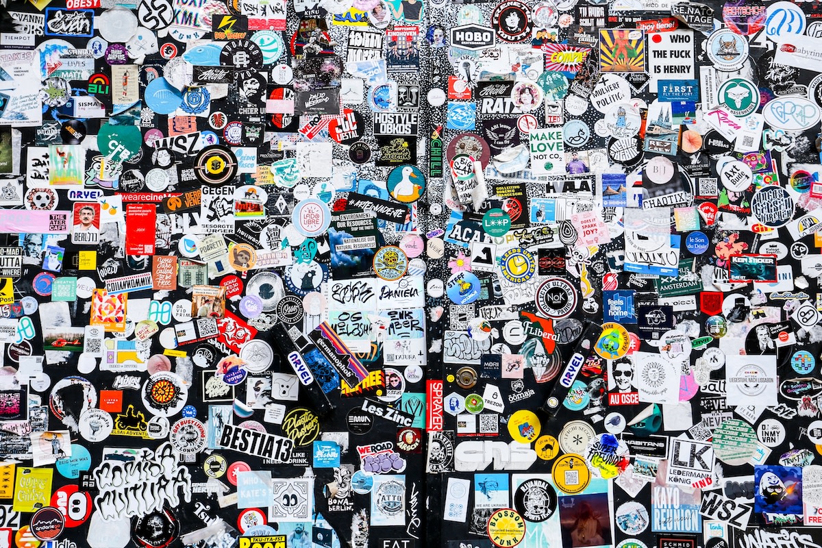 Couple Uses Creative and Quirky Vinyl Stickers to Create Collage Accent ...