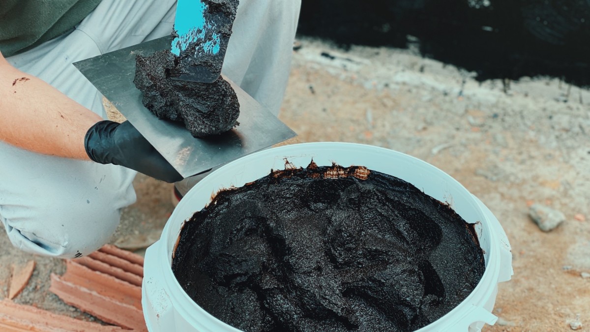 Contractors Mix Black Paint and Spackle to Create Beautiful Textured