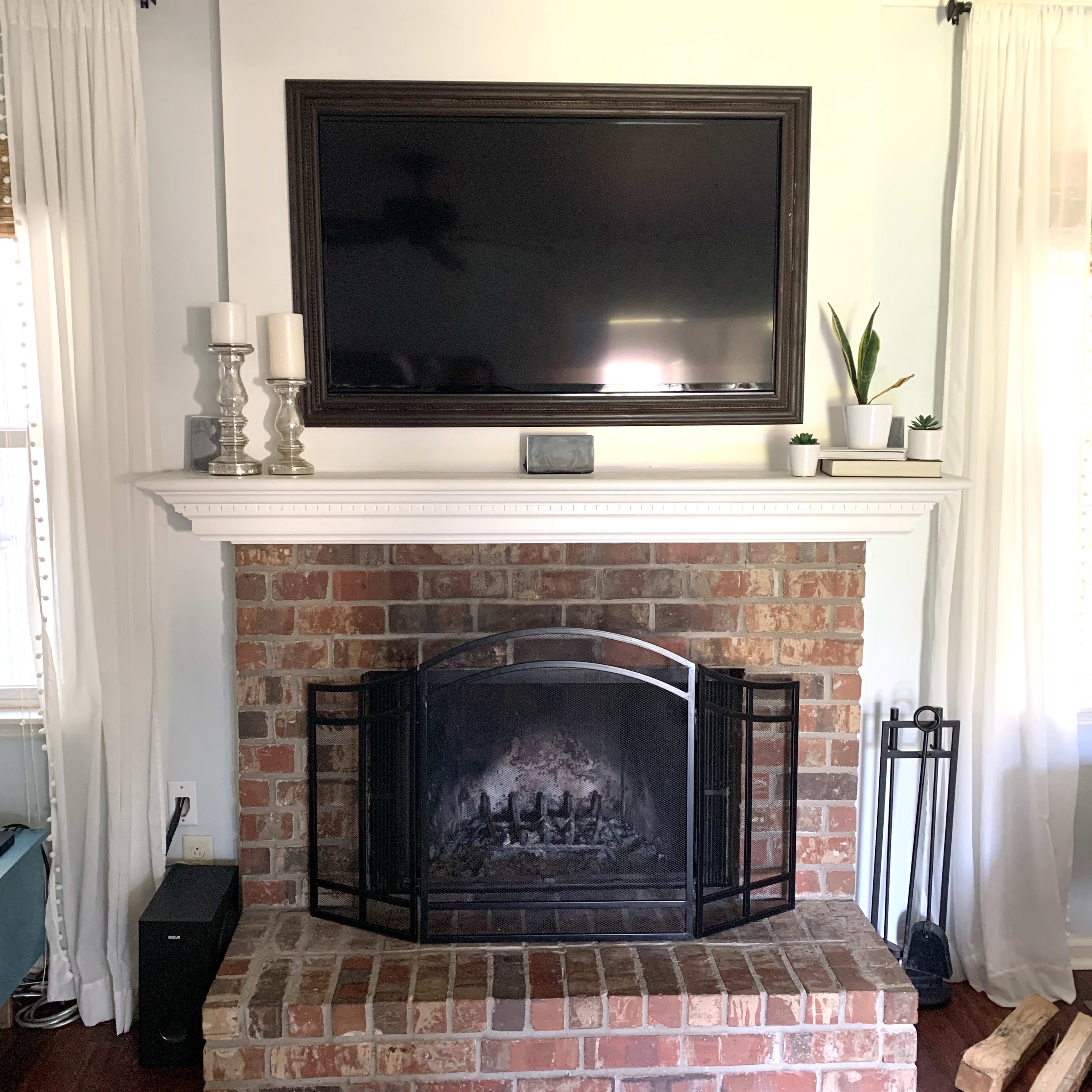 How I Painted My Brick Fireplace Black in 3 Easy Steps