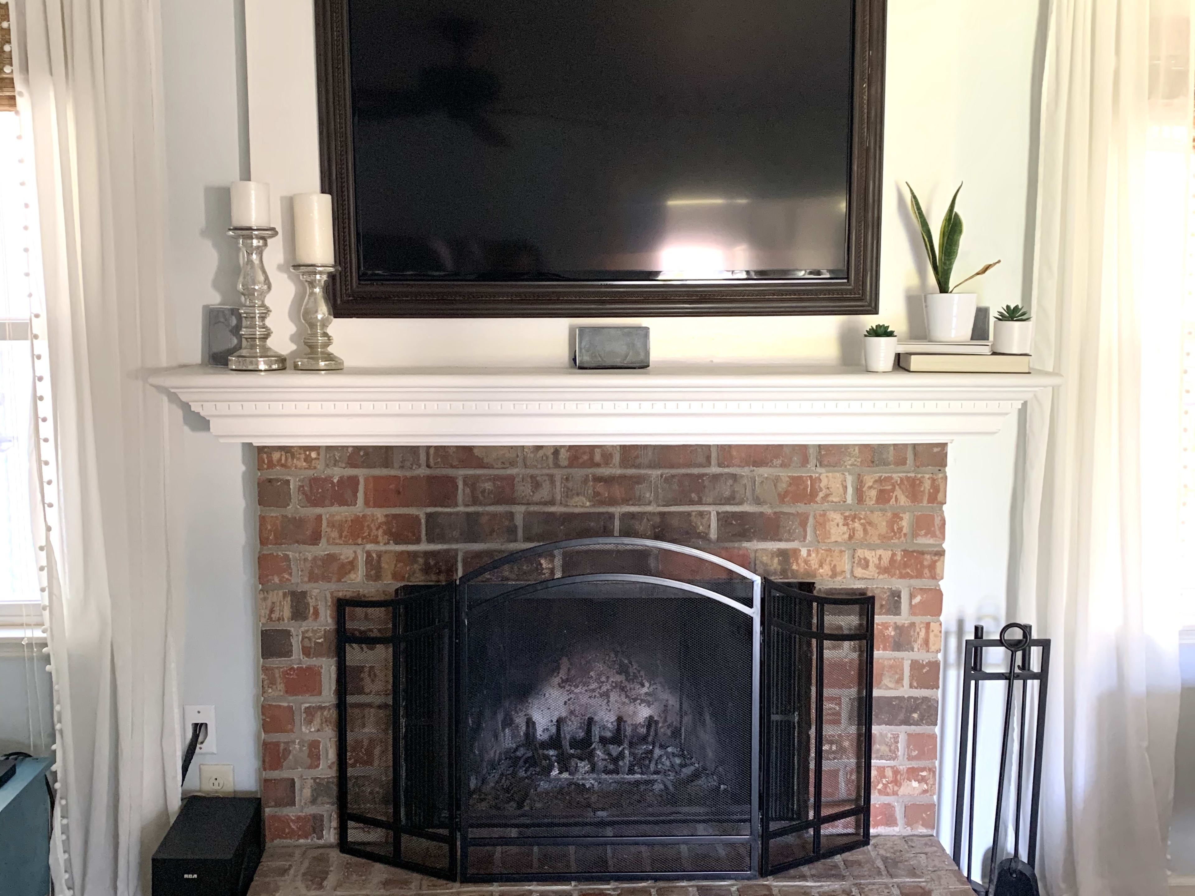 How I Painted My Brick Fireplace Black in 3 Easy Steps