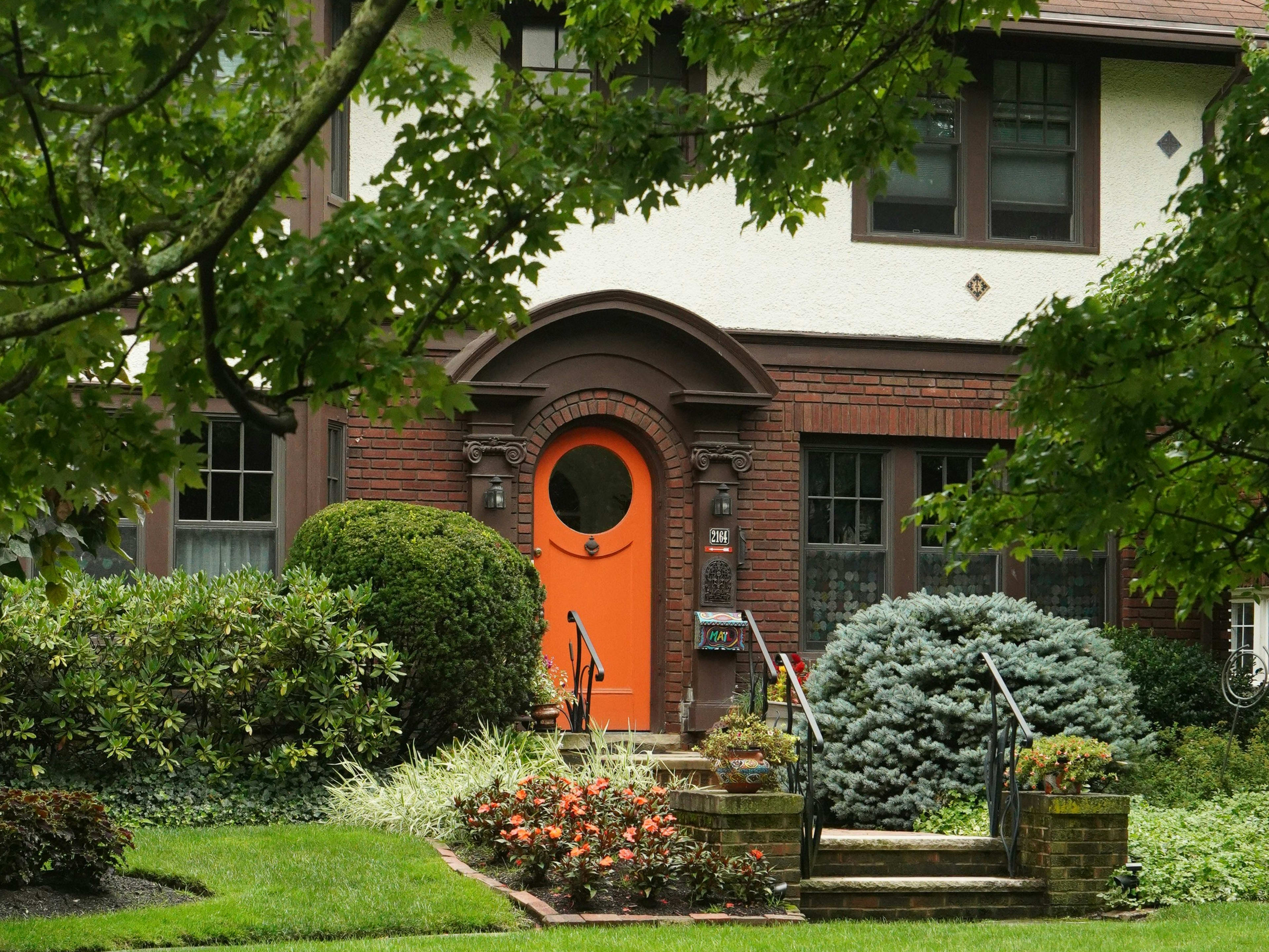 My Neighbor Has the Greenest Lawn on the Block (Even in August) — I Asked Him to Share His Secrets