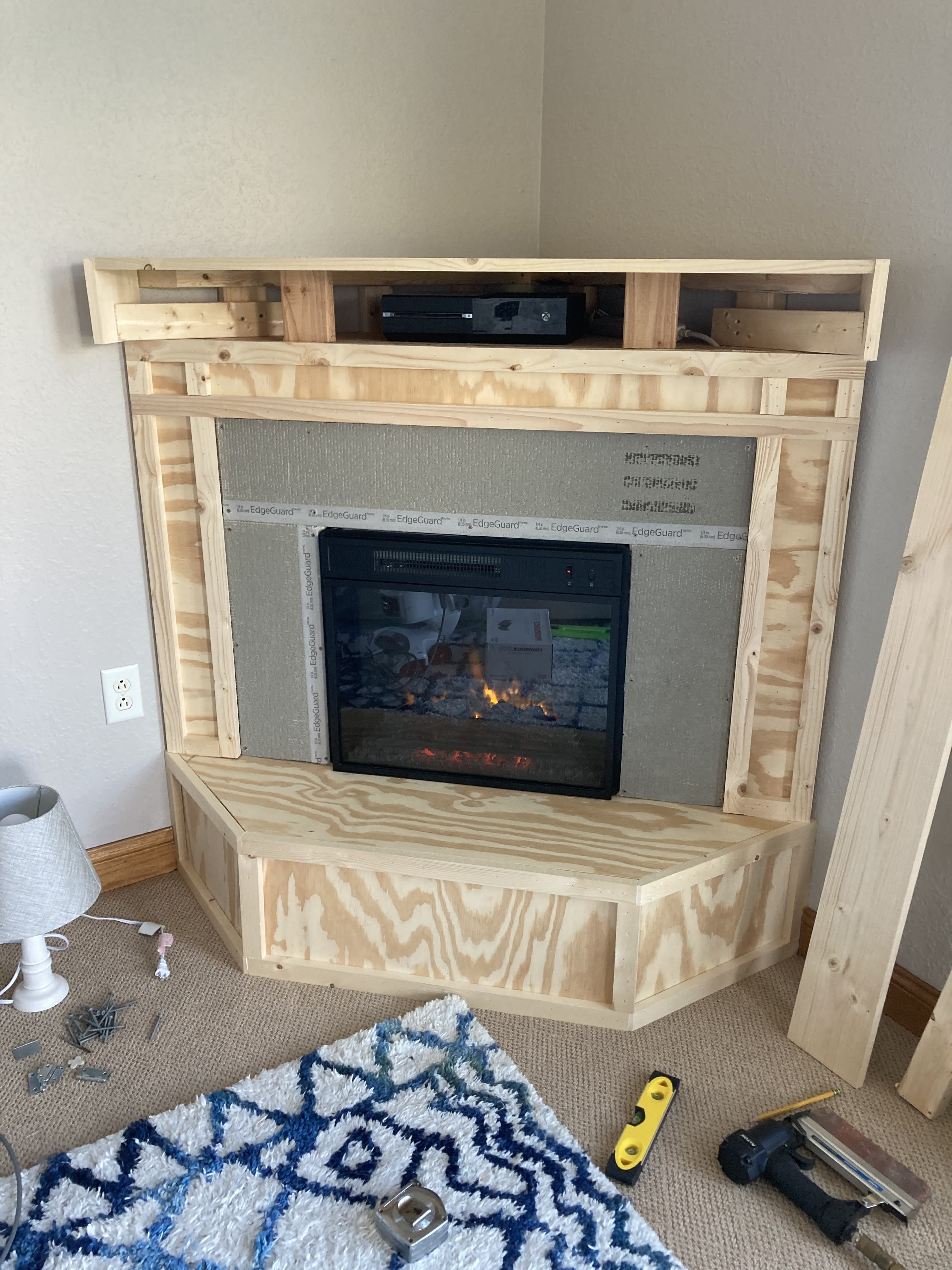 Diy corner tv stand with fireplace insert discount