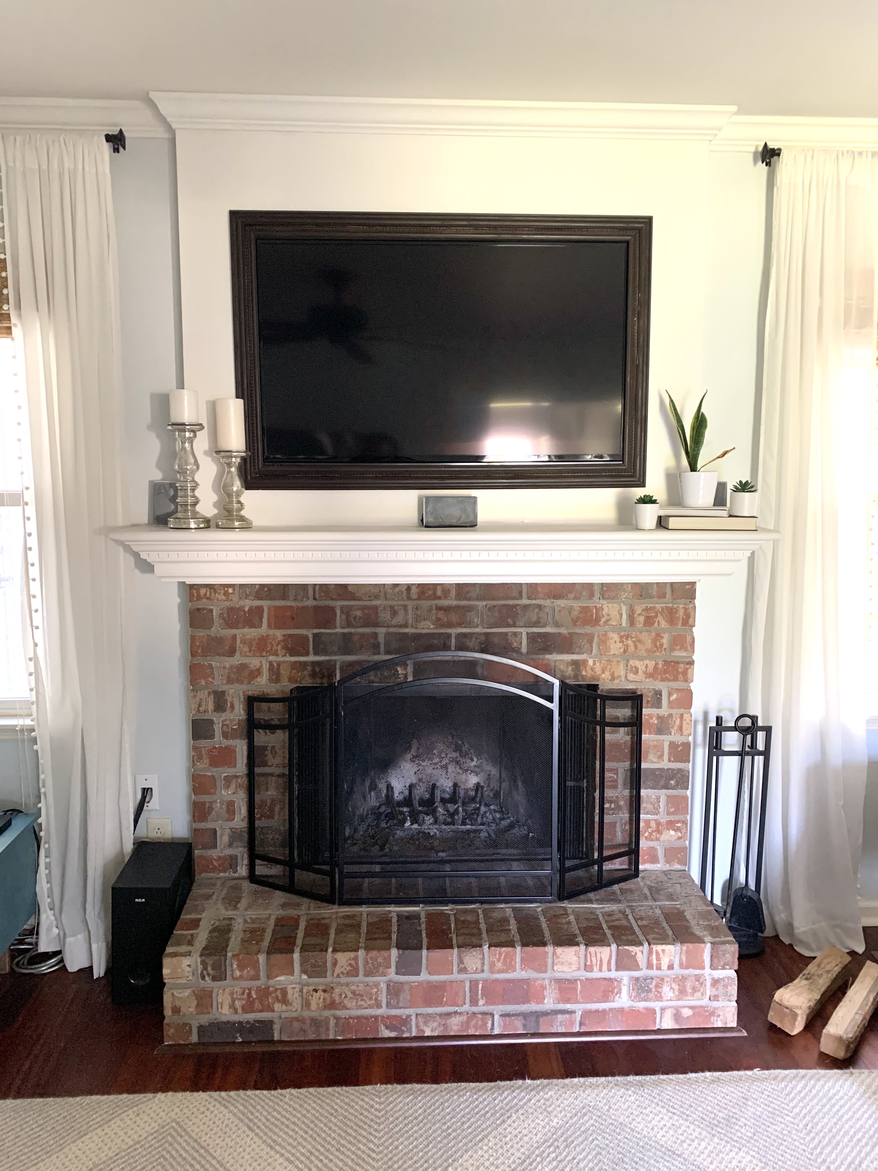 How I Painted My Brick Fireplace Black in 3 Easy Steps