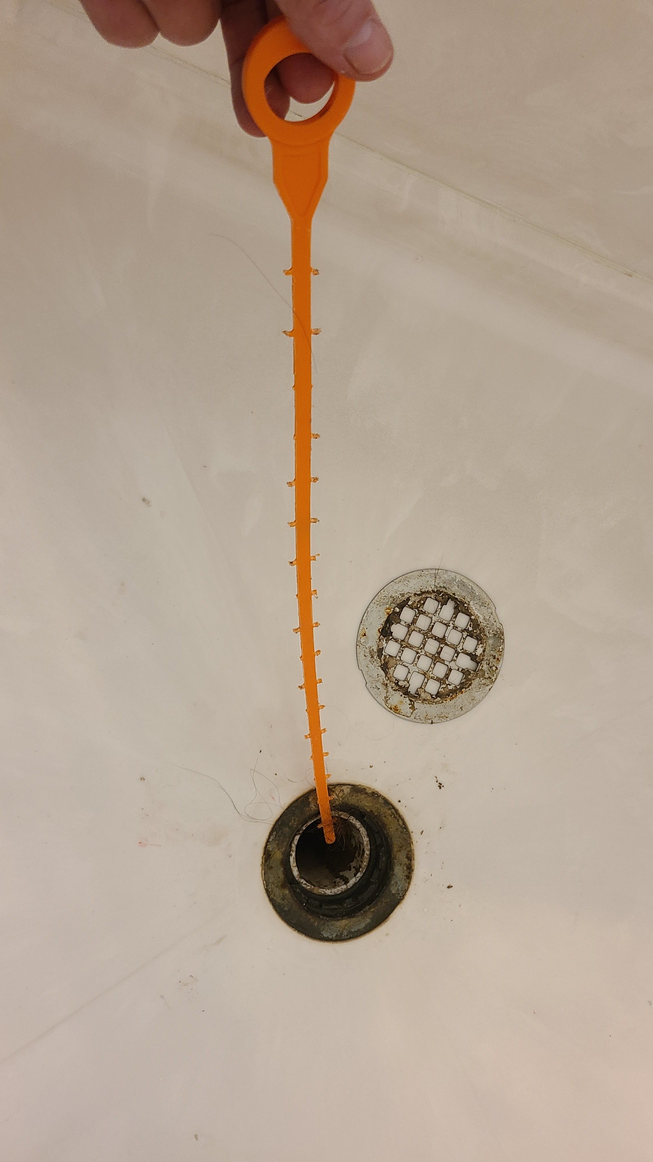Shower drain clogged with hair discount